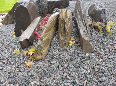 Kate Charles Garden Design - ‘Crevice planting’ into rocks and gravel, with tiny colourful alpines