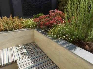 Kate Charles Garden Design - The seating has fragrant herbs and colourful plants behind to soften the space