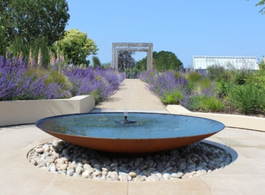 The CorTen Steel fountain bowl greets the visitor on entering the garden Kate Charles Garden Design -The CorTen Steel fountain bowl greets the visitor on entering the garden