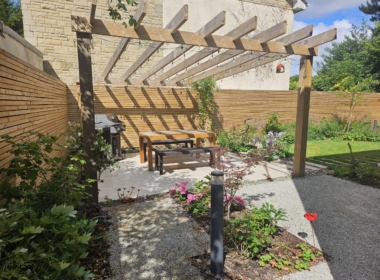 Kate Charles Garden Design - Bespoke pergola designed to fit the space